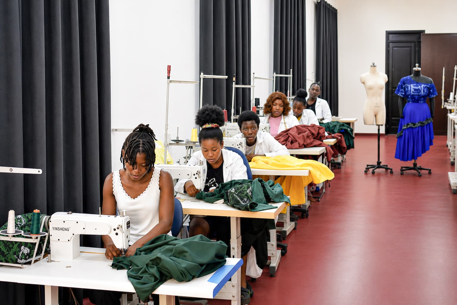 Saby Cobbs students presenting creative fashion work