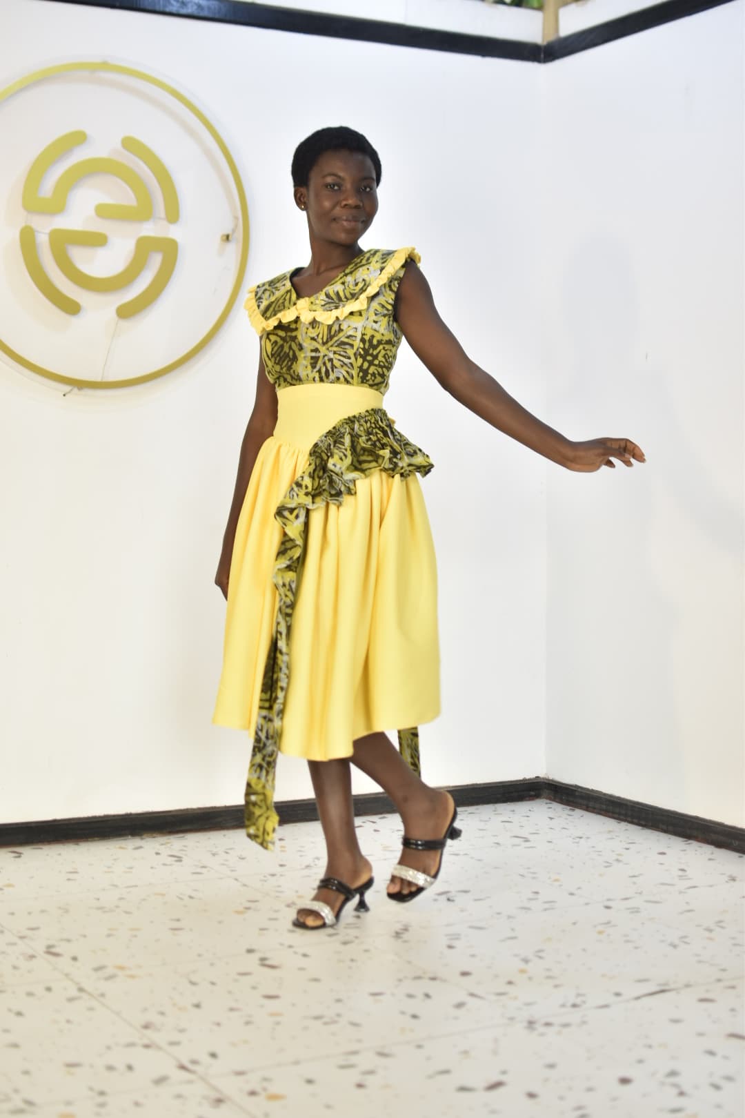 Student design — yellow and green outfit